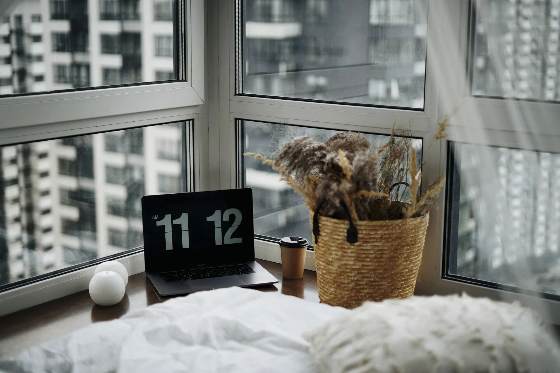 Laptop in city apartment
