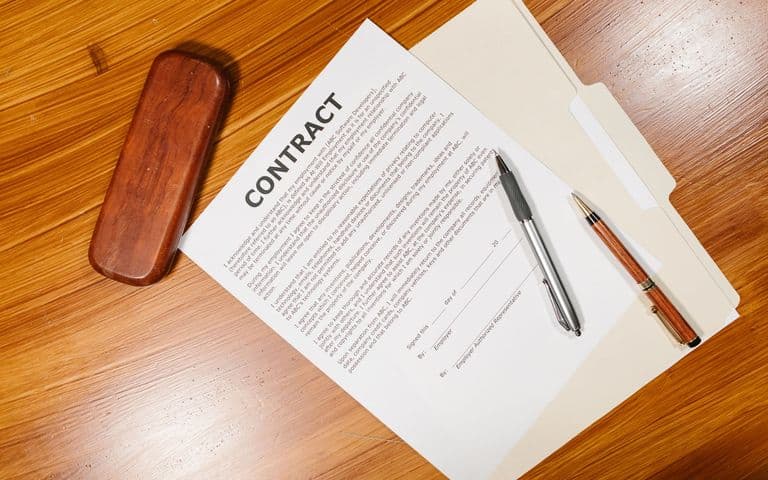 Contract document on wooden table